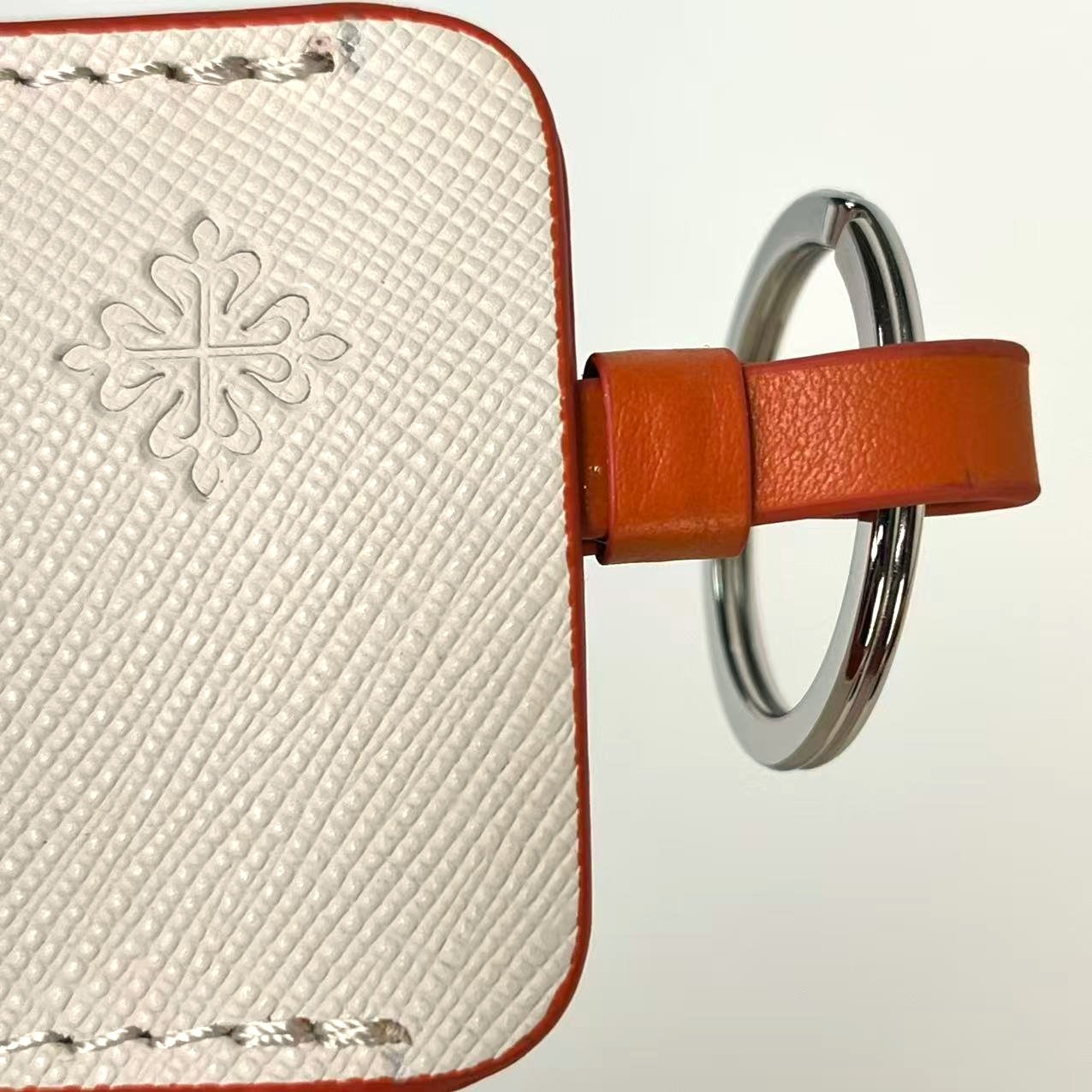 Patek Philippe Brown Leather Keychain with Embossed Logo and